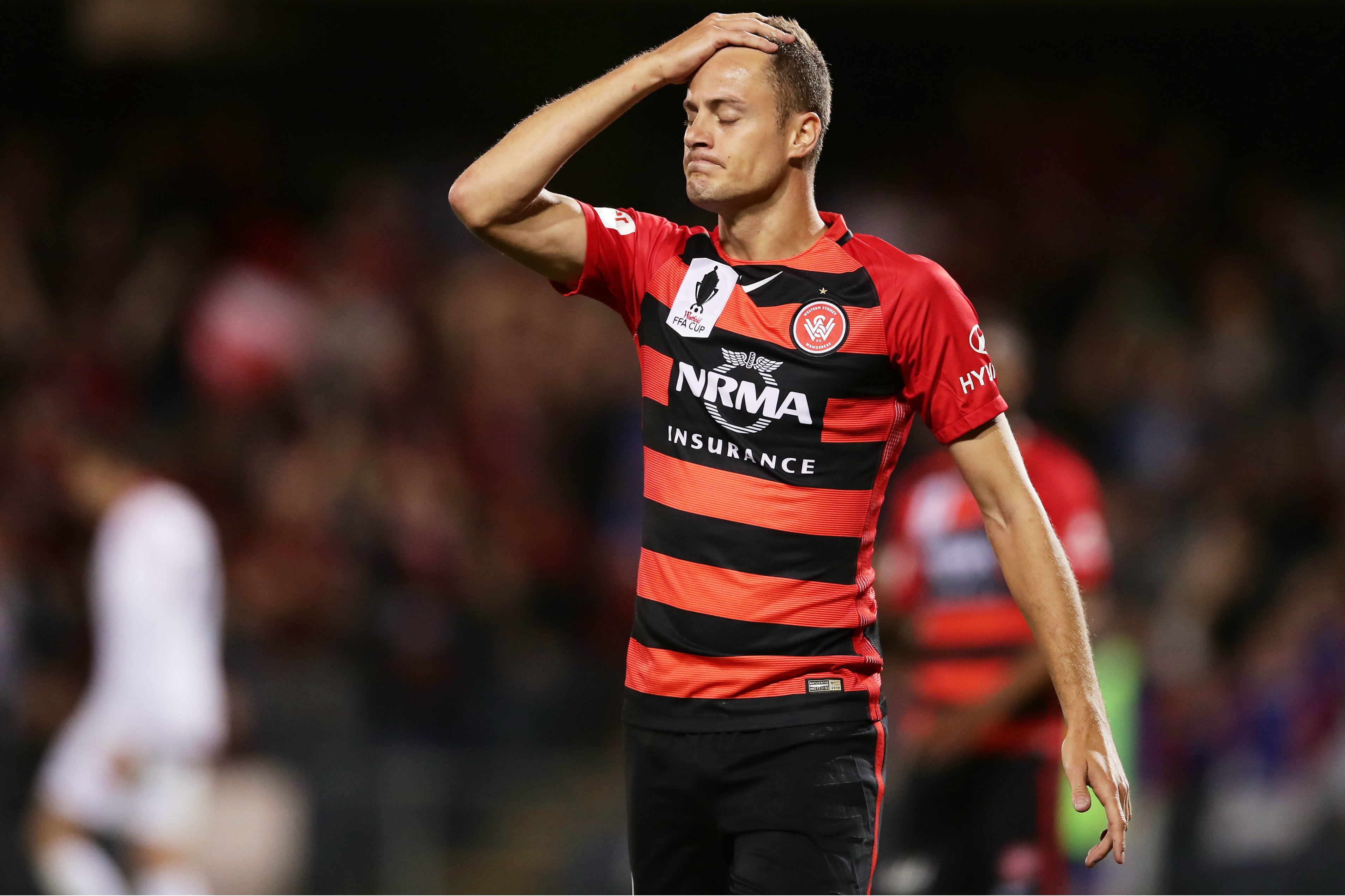 A disappointed Oriol Riera after missing a chance for the Wanderers