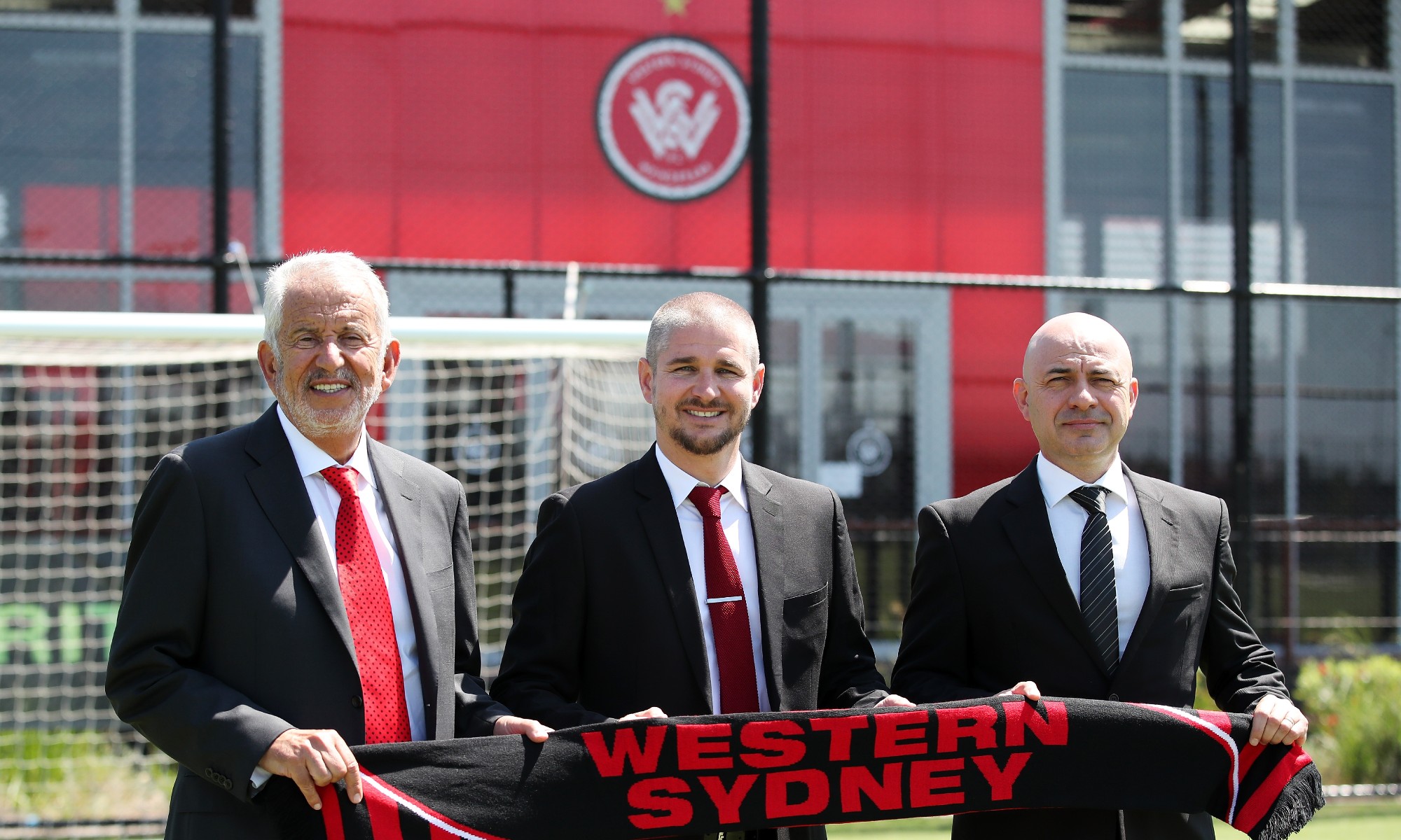 Western Sydney Wanderers Chairman Paul Lederer, newly appointed head coach Carl Robinson and Wanderers CEO John Tsatsimas