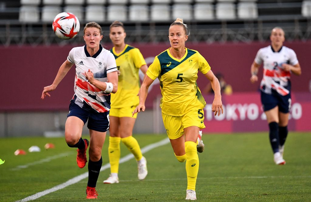 Britain's forward Ellen White (L) chases the ball with Australia's midfielder Aivi Luik (2nd R) during the Tokyo 2020 Olympic Games women's quarter-final football match between Britain and Australia at Ibaraki Kashima Stadium in Kashima city, Ibaraki prefecture on July 30, 2021. - - Japan OUT (Photo by SHINJI AKAGI / JIJI PRESS / AFP) / Japan OUT (Photo by SHINJI AKAGI/JIJI PRESS/AFP via Getty Images)