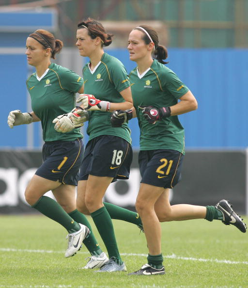 Australian goalkeepers, Melissa Barbieri (L), Lydia Williams (C) and Emma Wirkus (R) jog during a training session in Hangzhou, 14 September 2007 in eastern China's Zhejiang province, one day ahead of their second first round match in the FIFA Women's World Cup 2007 against Canada. Australia defeated Ghana 4-1 in their opening match. AFP PHOTO/Frederic J. BROWN (Photo credit should read FREDERIC J. BROWN/AFP via Getty Images)