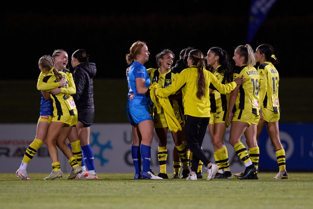 Phoenix players celebrate victory during the round 11 A-League Women's match between Canberra United and Wellington Phoenix at Viking Park, on February 11, 2022, in Canberra, Australia. (Photo by Brett Hemmings/Getty Images)