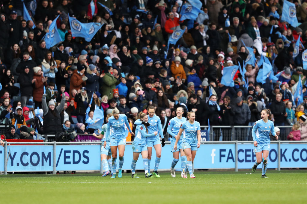 Caroline Weir of Manchester City celebrates with teammates after scoring City's goal during the Barclays FA Women's Super League match between Manchester City Women and Manchester United Women at The Academy Stadium on February 13, 2022 in Manchester, England. (Photo: Getty Images )