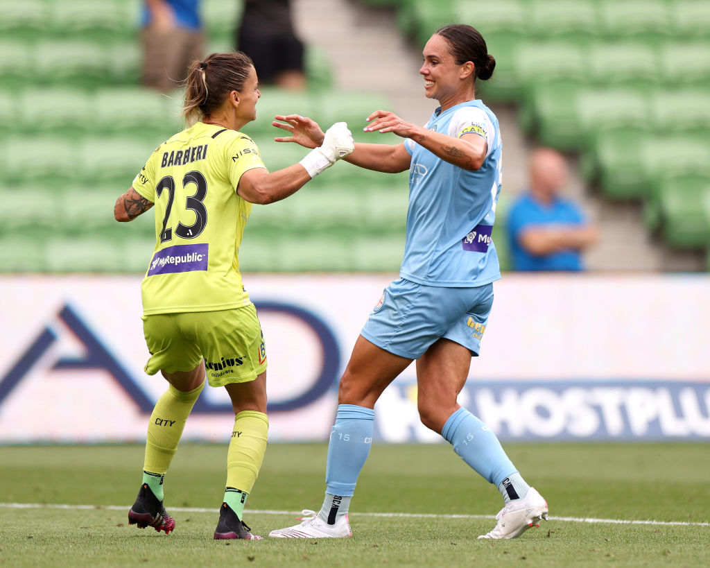 Emma Checker of Melbourne celebrates the win with teammate Melissa Barbieri during the round 12 A-League Women's match between Melbourne City and Sydney FC at AAMI Park, on February 20, 2022, in Melbourne, Australia. (Photo by Jonathan DiMaggio/Getty Images)