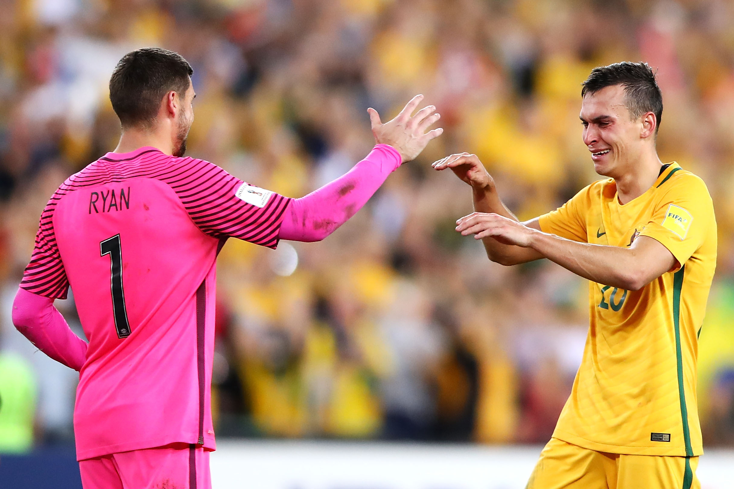 Trent Sainsbury cries with Mat Ryan after World Cup Qualifier against Honduras