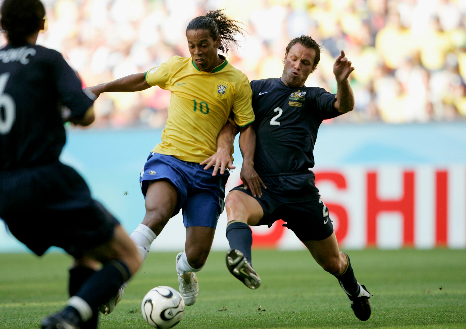 Lucas Neill and Ronaldinho