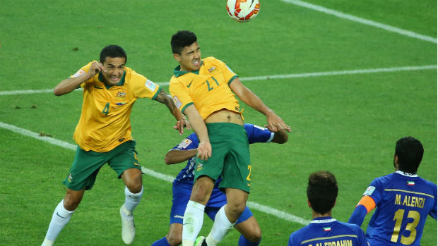 Massimo Luongo flies high to give the Socceroos the lead against Kuwait.