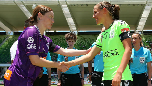 Grand Final captains Collette McCallum and Nicole Begg shake hands before the title decider.