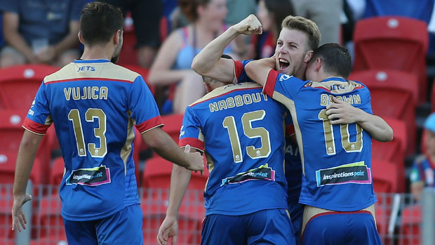 Jets players celebrate Andrew Hoole's goal in the clash with Wellington on Boxing Day.