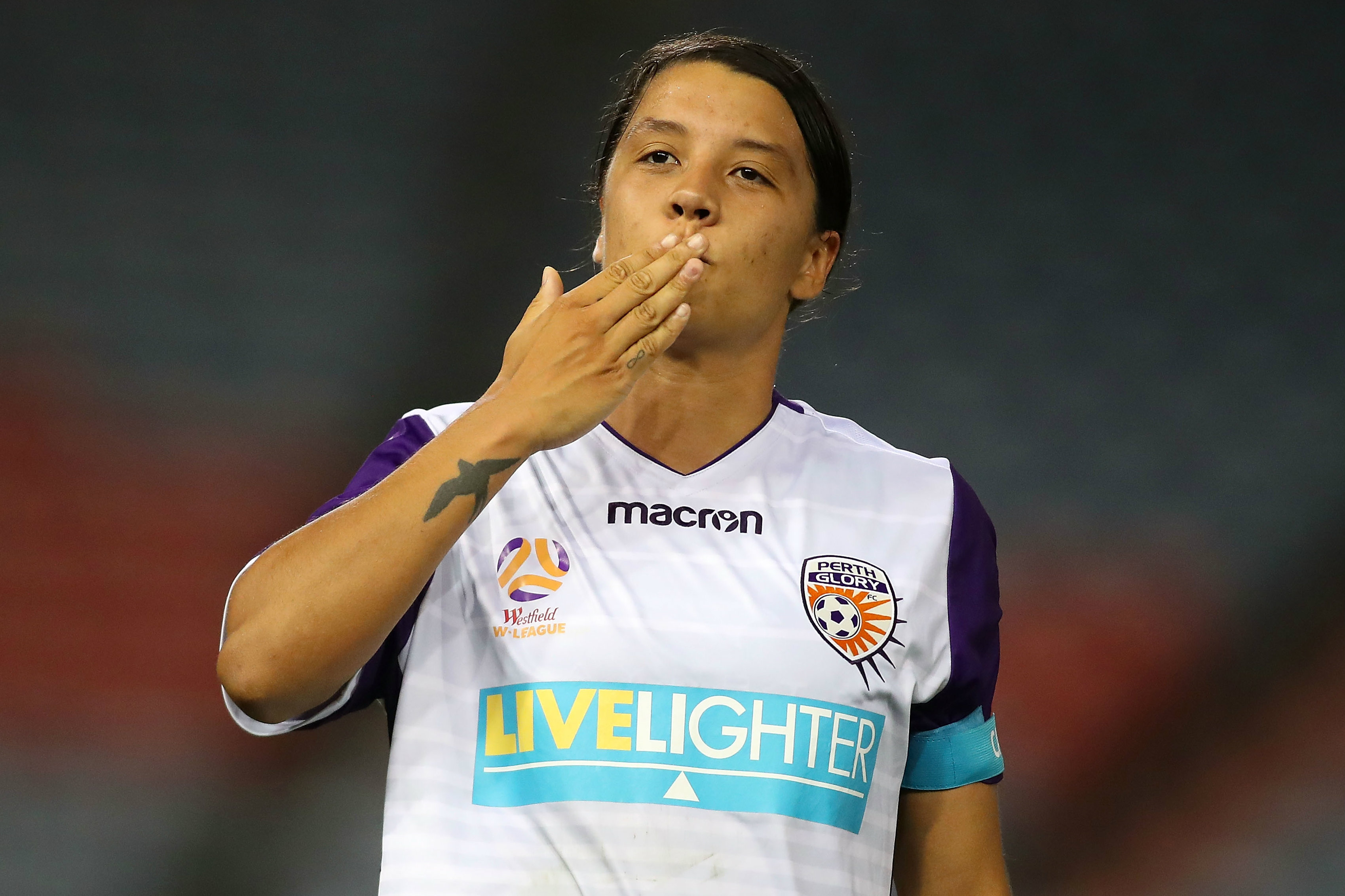 Sam Kerr celebrates one of her three goals against the Jets.
