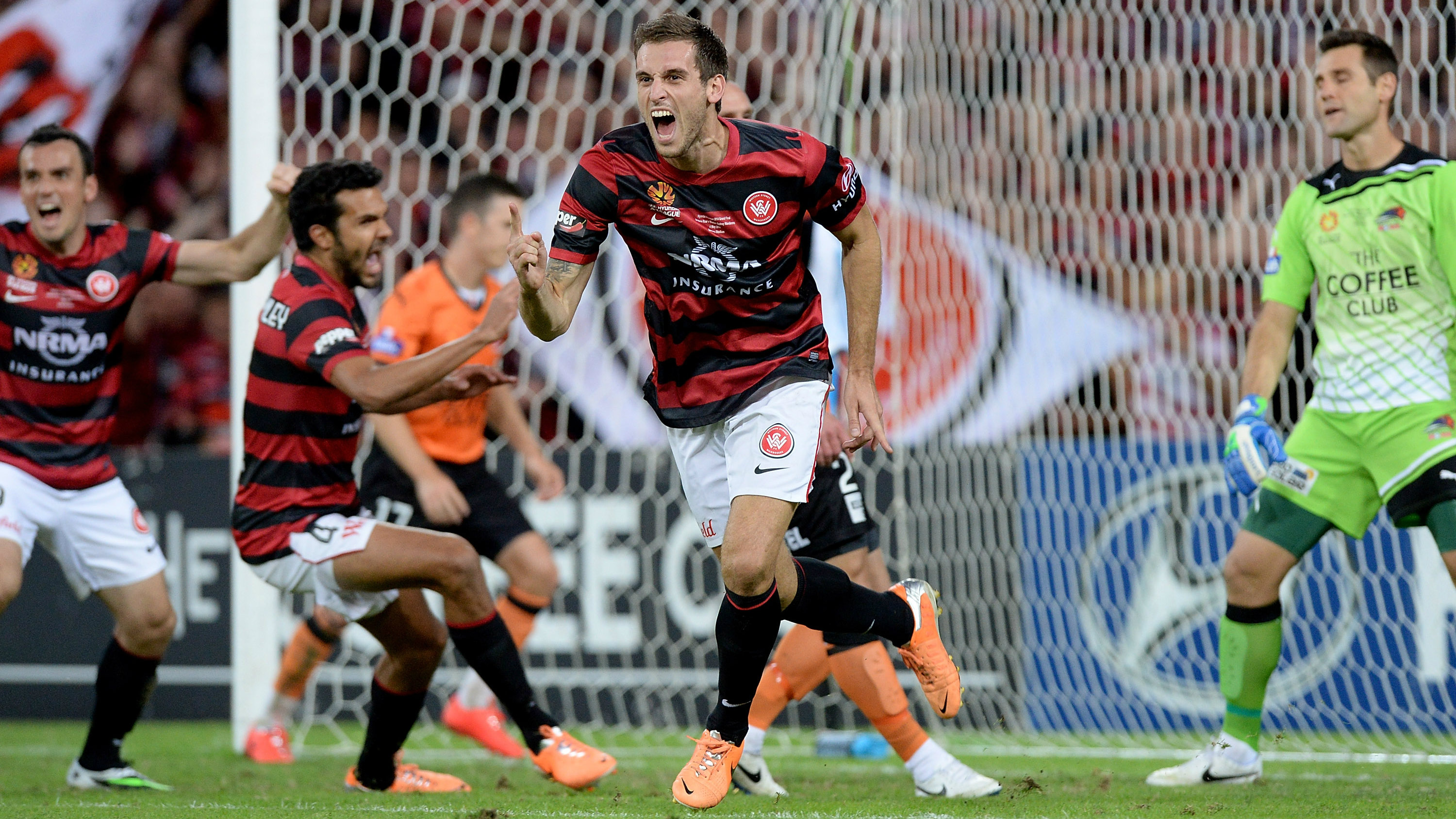 Matthew Spiranovic celebrates giving the Wanderers the lead in the 2014 Hyundai A-League grand final.