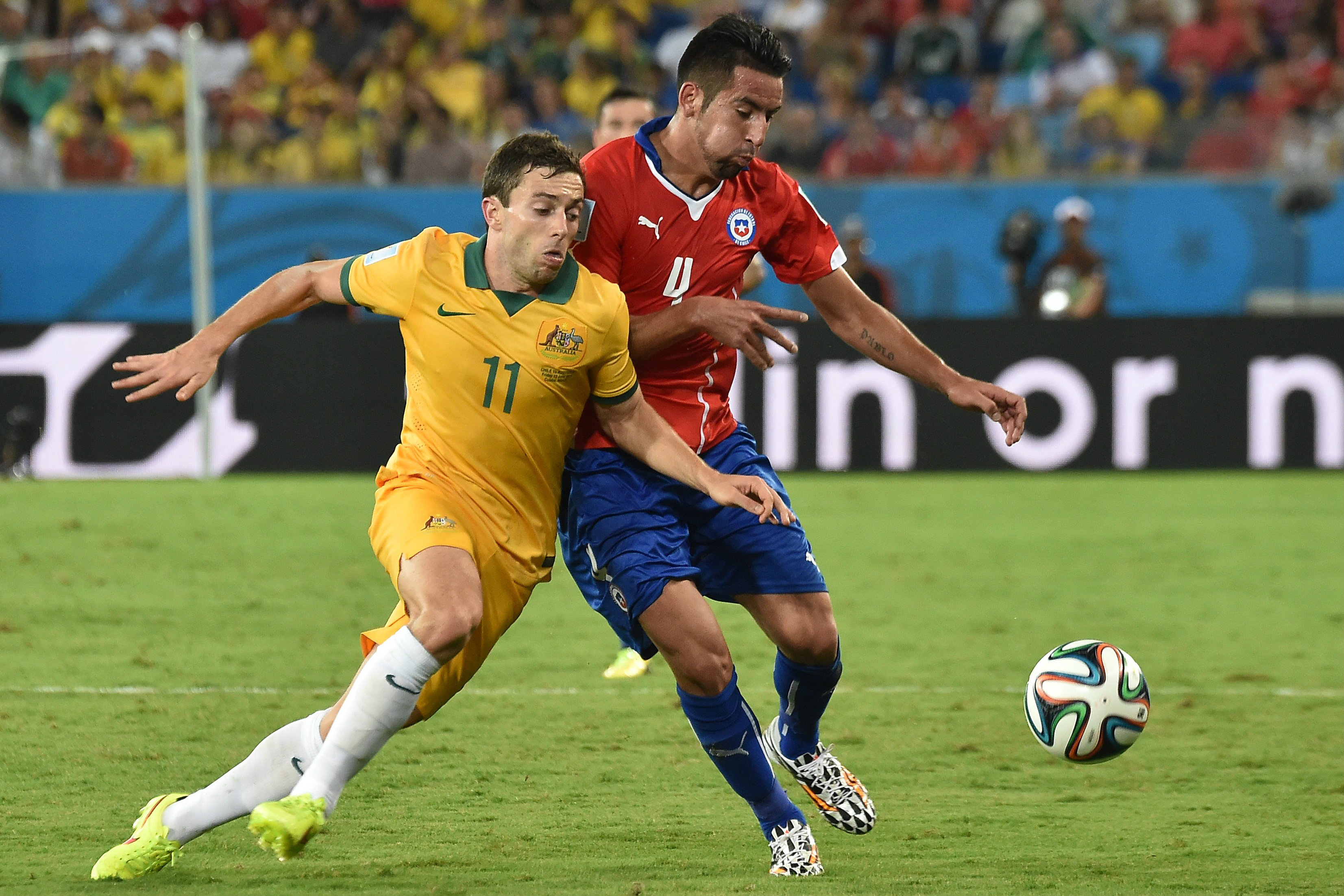 Tommy Oar  in action against Chile.